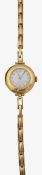 An 18ct lady's wristwatch half hunter