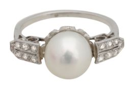 A diamond and pearl dress ring