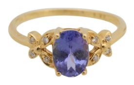 A tanzanite and diamond ring