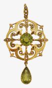 A 15ct gold peridot and seed pearl pendant
