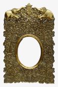 An Anglo-Indian repoussé gilt-metal photograph easel frame