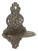 A cast iron wall shelf and bracket