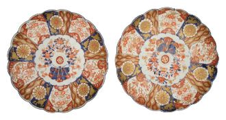 A pair of Japanese Imari porcelain plates