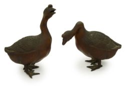 A pair of Japanese bronze okimono