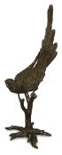 A large bronze figure of a parrot