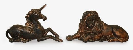 A pair of Victorian cast iron fire dogs