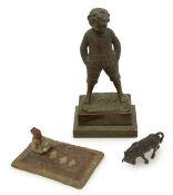 A figure of a bronze boy
