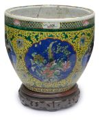 A Chinese yellow ground pottery fish bowl