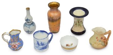 A collection of miniature pottery wares