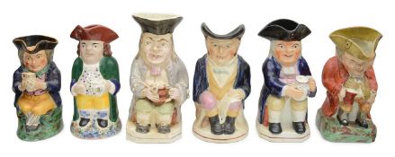 A group of six pottery Toby jugs