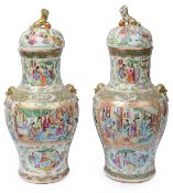 A large pair of Chinese Canton famille rose porcelain vases and covers