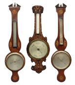 A Victorian oak wheel barometer, Negretti & Zambra, with two others