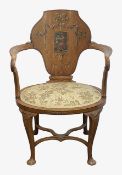 A Sheraton Revival painted satinwood armchair