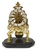 A Victorian brass skeleton clock