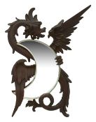 A carved oak wall mirror