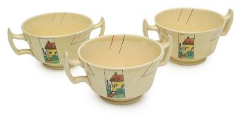 A set of three Clarice Cliff Moderne Casamia pattern twin-handled cups