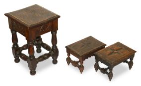 A group of three oak stools