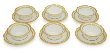 A set of six Limoges porcelain teabowls and saucers