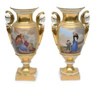 A pair of Continental porcelain urns