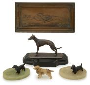 A pair of Hixon, Staffordshire alabaster ashtrays, mounted with bronzed figures of dogs, with three