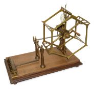 A Victorian brass wool winder