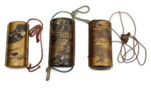 A group of Japanese gold and black lacquer inro