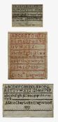 A group of three small alphabet samplers