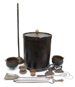 A barrel-form log box and domestic items