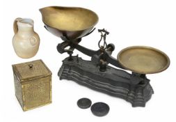 A set of brass kitchen scales