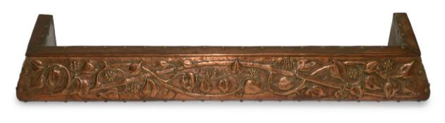 An Art Nouveau copper fire fender