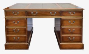 A 19th century style mahogany twin pedestal desk