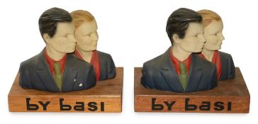A pair of Soviet style pottery figures