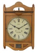 An oak wall clock