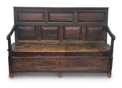 An oak box settle