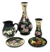 A group of Moorcroft pottery