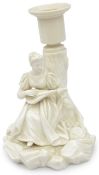 A Royal Worcester blanc-de-chine figural candlestick,