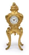 A Louis XV style ormolu miniature timepiece