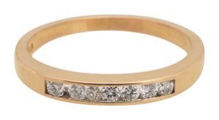 An 18ct rose gold eternity ring