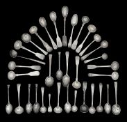 A collection of George III and later silver cruet and coffee spoons