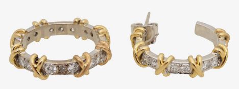 A diamond full eternity ring with matching single ear hoop