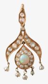 An Edwardian style opal drop pendant