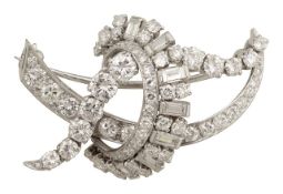 A diamond abstract brooch