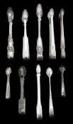 A group of ten silver sugar tongs, including Scottish provincial