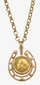A George V 19*8 gold sovereign mounted in horseshoe pendant on chain