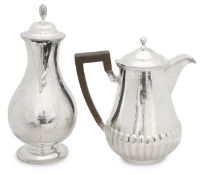 A George III and a Victorian silver hot water jug