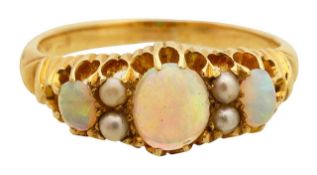 An opal and seed pearl ring