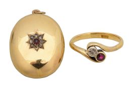 A Victorian diamond and ruby locket and cross over ring
