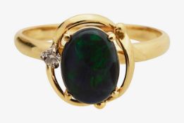 A diamond and black opal ring
