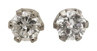 A pair of diamond earrings