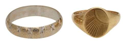 A 18ct band and 9ct signet ring